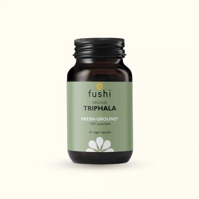 Fushi Organic Triphala fresh-ground supplement bottle with vegan capsules.