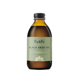 Bottle of fushi Black Seed Oil on a white background