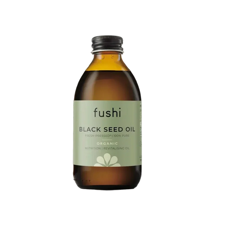 Bottle of fushi Black Seed Oil on a white background