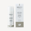 Green People scent-free facial SPF 15 sun cream with aloe vera and prebiotics, suitable for sensitive skin, 66% organic, shown with both the tube and its outer packaging box.