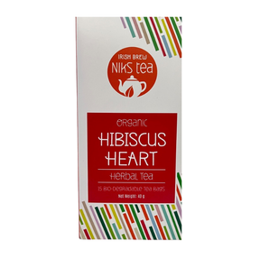 A box of Irish Brew NIKS Tea, "Organic Hibiscus Heart" herbal tea, containing 15 bio-degradable tea bags with a net weight of 40g, featuring colorful geometric border patterns.