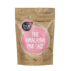 A 500g brown paper pouch of True Fine Himalayan Pink Salt with a pink circular label and white line art.