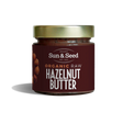 Sun & Seed organic raw hazelnut butter in a glass jar.