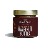 Sun & Seed organic raw hazelnut butter in a glass jar.