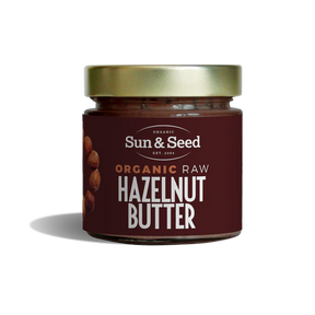 Sun & Seed organic raw hazelnut butter in a glass jar.