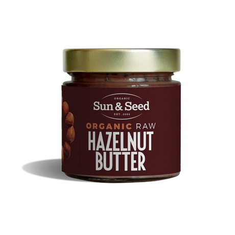 Sun & Seed organic raw hazelnut butter in a glass jar.