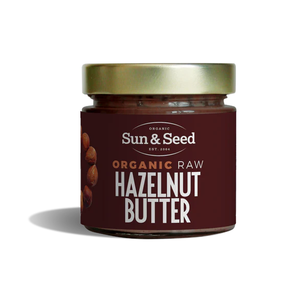 Sun & Seed organic raw hazelnut butter in a glass jar.