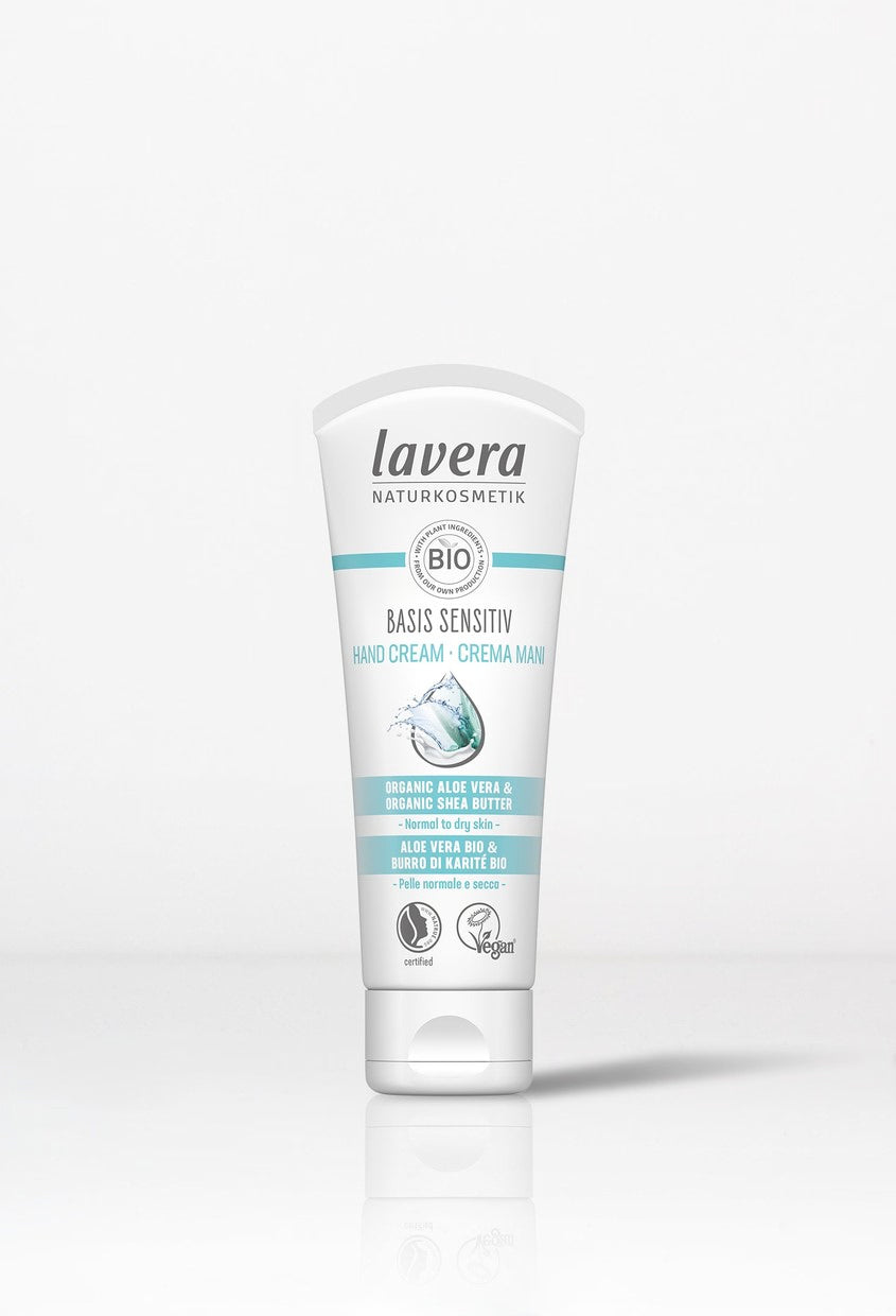Minimalist studio shot of Lavera Basis Sensitiv organic hand cream.