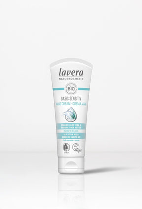 Minimalist studio shot of Lavera Basis Sensitiv organic hand cream.