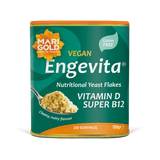 Marigold Engevita nutritional yeast flakes canister with a spoonful of flakes.