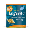 Marigold Engevita nutritional yeast flakes canister with B12 on a solid black background.