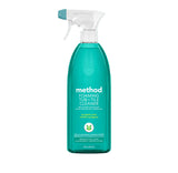 A bottle of Method Foaming Tub + Tile Cleaner with a white spray top and teal liquid, centered on a teal-to-green gradient background.