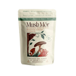 Mush Mór mushroom powder pouch on a pedestal with an abstract botanical wave background.