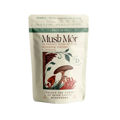 Mush Mór mushroom powder pouch on a pedestal with an abstract botanical wave background.