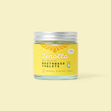 A glass jar of Zerolla eco-natural mouthwash tablets with a yellow label, featuring a "Shouty Italian Lemon" flavor and marked as "Zero Fluoride."