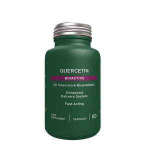 Quercetin Bioactive supplement in a matte green bottle with a silver cap on a black background.