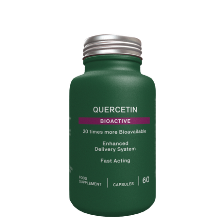 Quercetin Bioactive supplement in a matte green bottle with a silver cap on a black background.
