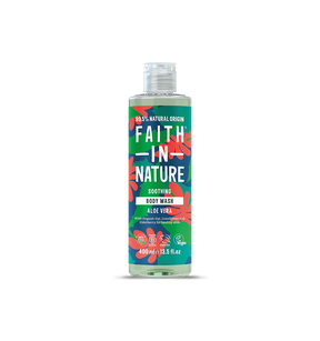 Bottle of "Faith in Nature" Aloe Vera body wash with a bold, green and red floral design on a black background. Labels emphasize natural origin.