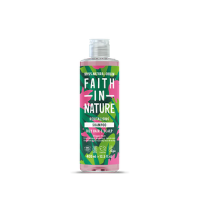 Bottle of "Faith in Nature" revitalising shampoo for oily hair. Features vibrant green and pink leaf patterns, emphasizing natural origins.