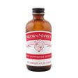 Bottle of Nielsen-Massey pure peppermint extract on a white background