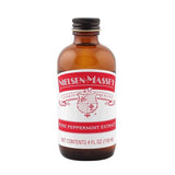 Bottle of Nielsen-Massey pure peppermint extract on a white background