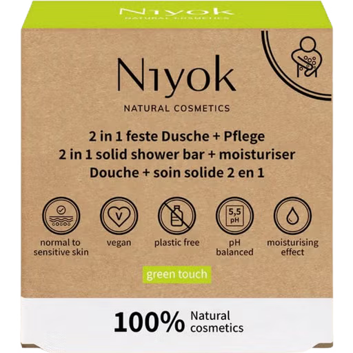 Niyok 2 in 1 solid shower bar and moisturiser box in "green touch" with a cardboard aesthetic.
