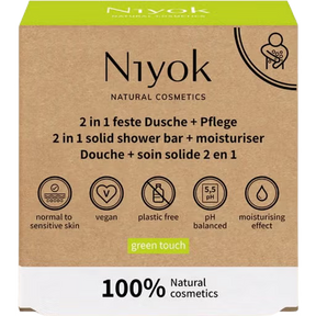Niyok 2 in 1 solid shower bar and moisturiser box in "green touch" with a cardboard aesthetic.