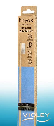 Niyok natural bamboo toothbrush in sustainable brown and blue eco-friendly cardboard packaging.