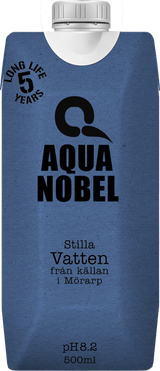 A blue 500ml carton of Aqua Nobel still water from the spring in Mörarp, featuring a pH of 8.2 and a 5-year shelf life.