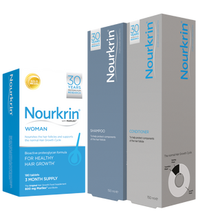 Nourkrin Woman hair growth supplement box alongside Nourkrin shampoo and conditioner bottles.