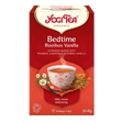A red box of Yogi Tea Organic Bedtime Rooibos Vanilla featuring an Ayurvedic blend with chamomile flowers and vanilla beans on a white background.