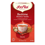 A red box of Yogi Tea Organic Bedtime Rooibos Vanilla featuring an Ayurvedic blend with chamomile flowers and vanilla beans on a white background.