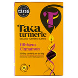 A yellow and purple box of Taka Turmeric Organic Hibiscus Cinnamon tea, containing 15 unbleached tea bags with 1000mg of turmeric per bag.