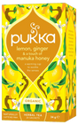 A vibrant yellow box of Pukka Organic Lemon, Ginger & Manuka Honey herbal tea, featuring a warming caffeine-free blend to soothe the senses containing 20 sachets.