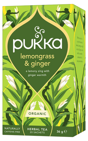 A bright green box of Pukka Organic Lemongrass & Ginger herbal tea, featuring a caffeine-free blend of lemony zing and ginger warmth containing 20 sachets.