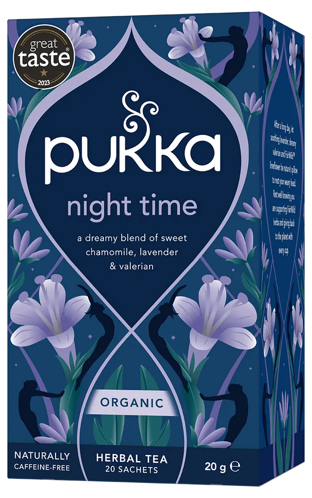 A dark blue box of Pukka Organic Night Time herbal tea, featuring a dreamy caffeine-free blend of oatflower, lavender, and limeflower containing 20 sachets.