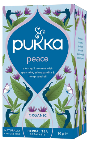 A light blue box of Pukka Organic Peace herbal tea, featuring a tranquil caffeine-free blend of spearmint, ashwagandha, and hemp seed oil containing 20 sachets.