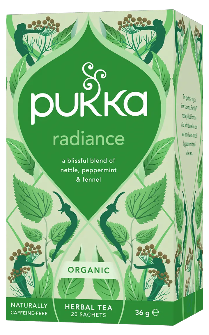 A light green box of Pukka Organic Radiance herbal tea, featuring a caffeine-free, blissful blend of nettle, peppermint, and fennel containing 20 sachets.