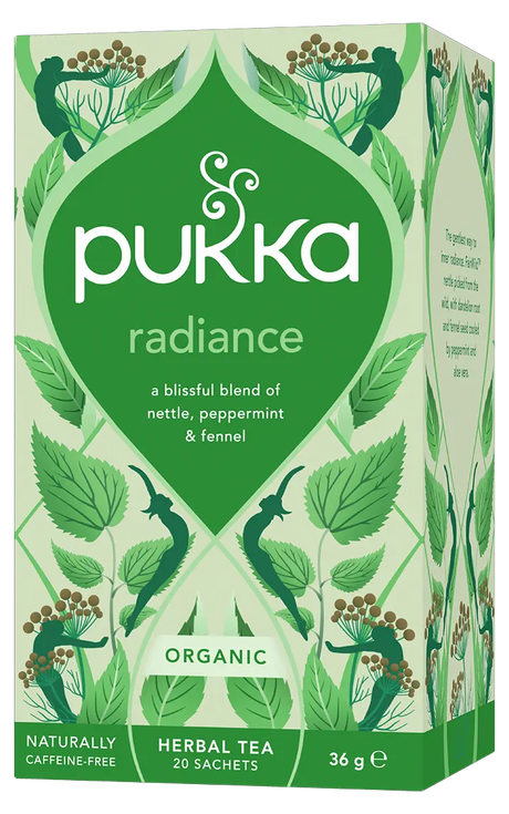 A light green box of Pukka Organic Radiance herbal tea, featuring a caffeine-free, blissful blend of nettle, peppermint, and fennel containing 20 sachets.