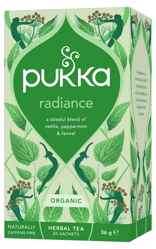 A light green box of Pukka Organic Radiance herbal tea, featuring a caffeine-free, blissful blend of nettle, peppermint, and fennel containing 20 sachets.