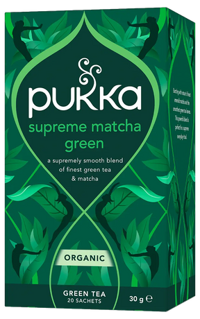 A dark green box of Pukka Organic Supreme Matcha Green tea, featuring a smooth blend of green tea and emerald matcha powder containing 20 sachets.