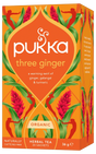 An orange box of Pukka Organic Three Ginger herbal tea, featuring a warming caffeine-free blend of ginger, galangal, and turmeric containing 20 sachets.