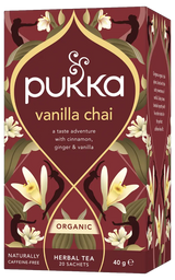 A box of Pukka Organic Vanilla Chai herbal tea, featuring a caffeine-free blend of cinnamon, ginger, and vanilla with 20 sachets.