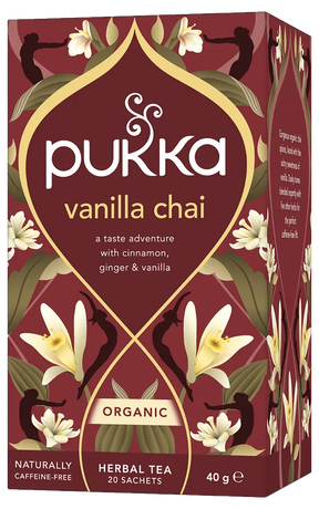 A box of Pukka Organic Vanilla Chai herbal tea, featuring a caffeine-free blend of cinnamon, ginger, and vanilla with 20 sachets.