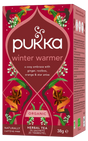 A red box of Pukka Organic Winter Warmer herbal tea, a caffeine-free blend of ginger, rooibos, orange, and star anise containing 20 sachets.