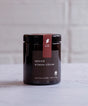 A 6oz Irish-made spiced winter citrus soy wax candle jar.