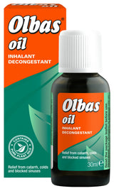 Olbas Oil inhalant decongestant bottle and box featuring a leaf motif on an orange and green background.