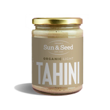 Sun & Seed Organic Light Tahini glass jar with a gold lid.