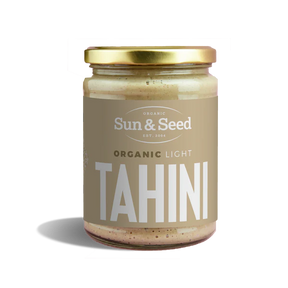 Sun & Seed Organic Light Tahini glass jar with a gold lid.