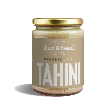 Sun & Seed Organic Light Tahini glass jar with a gold lid.